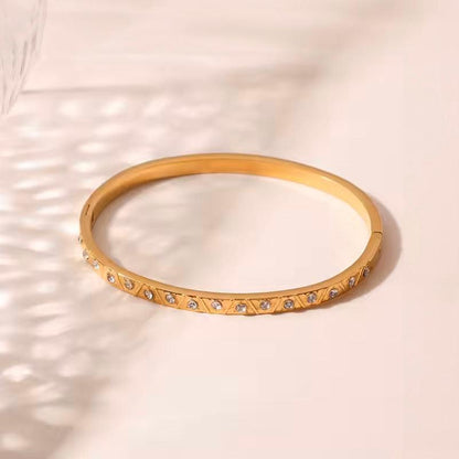 Aurora Zircon Gold Bangle